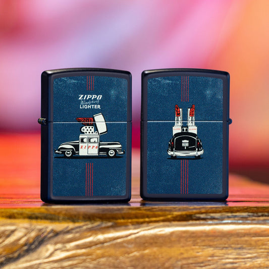 Lifestyle image of two Zippo Vintage Zippo Car Design Navy Matte Windproof Lighters standing on a bar; one showing the front of the lighter while the other shows the back of the lighter.