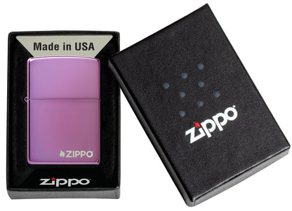 Classic High Polish Purple Windproof Lighter with Zippo Logo in its packaging.