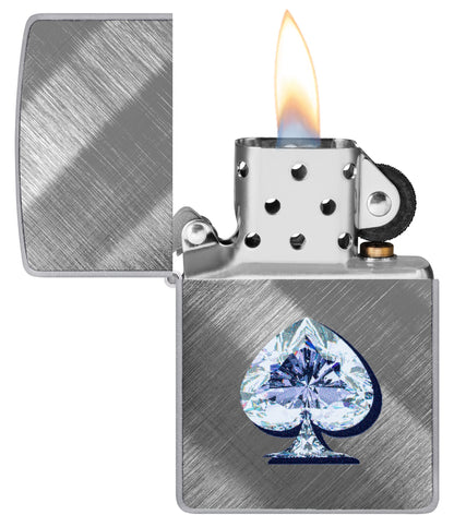 Zippo Gleaming Spade Design Diagonal Weave Windproof Lighter with its lid open and lit.