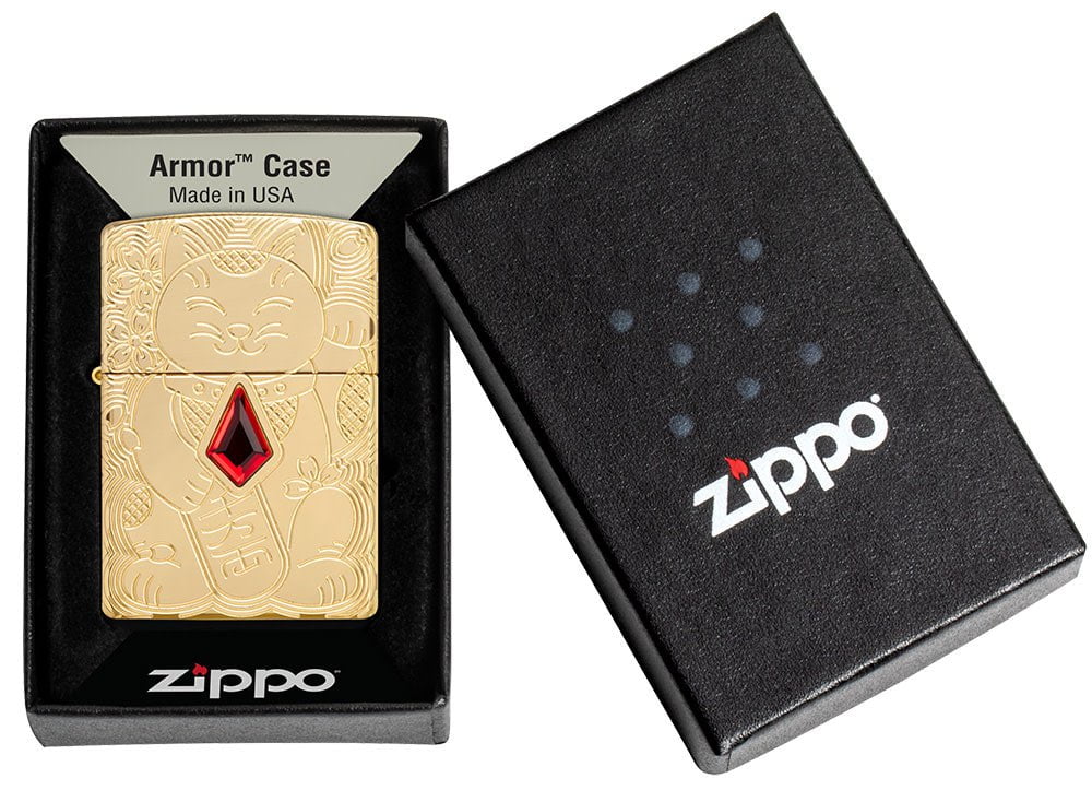 Lucky Cat Design Emblem Attached ArmorÂ® High Polish Brass Windproof Lighter in its packaging.