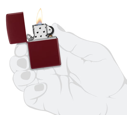 Zippo Classic Merlot Windproof Lighter lit in hand.