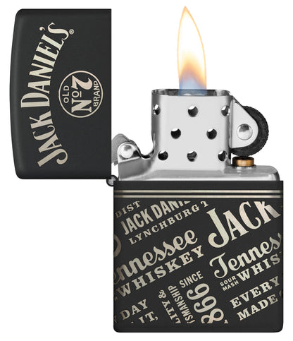 Zippo Jack Daniel'sÂ® Every Drop Design Regular Media Chrome Black Matte Windproof Lighter with its lid open and lit.
