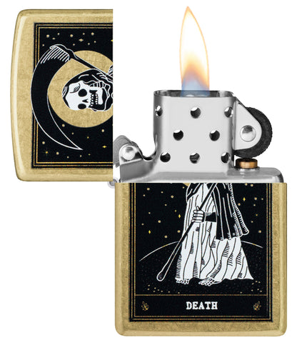 Zippo Death Card Desig Street Brass Windproof Lighter with its lid open and lit.